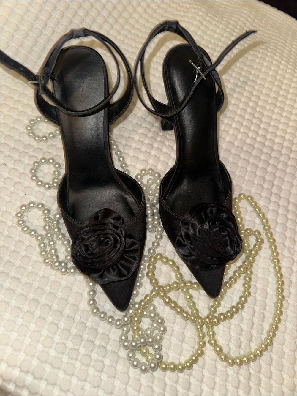 Call It Spring Black Satin Pointed-Toe Ankle-Strap Heels with Floral Rosette